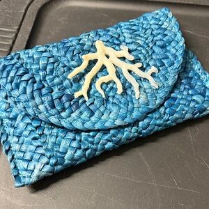 Elegant Blue Woven Clutch with White Detail